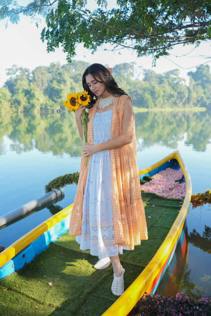 Women’s sky blue embroidered cotton midi dress with orange checkered long shrug and multicolour detailing.